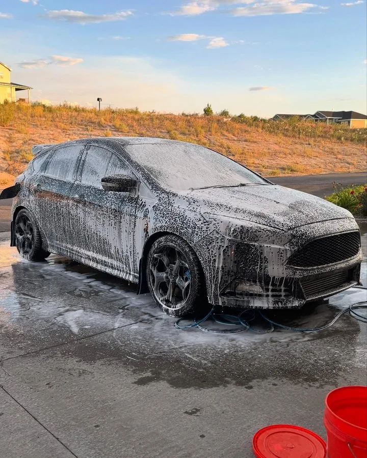 Ford Focus ST in foam wash during ceramic coating prep in Idaho Falls
