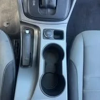 Center console after interior detail in Idaho Falls — spotless cupholders and trim