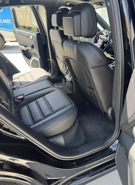 Luxury SUV before interior detail in Idaho Falls — dirty floors and seats