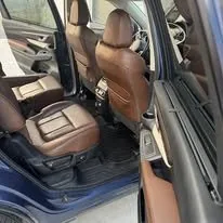 Midsize SUV after interior detail in Idaho Falls — clean floors and tan leather